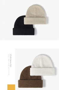 Detail view of thick ribbed fisherman hats in black, beige, coffee and white colors