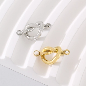 Polished stainless steel heart knot connectors in gold and silver for DIY jewelry making