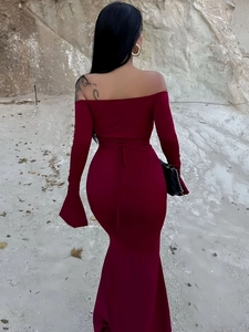 Detail of burgundy off-shoulder maxi dress with elegant slim fit and fishtail hemline