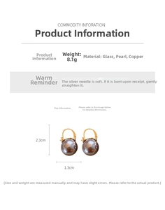 Detailed view of dark grey pearl drop earrings with gold hooks and size measurements