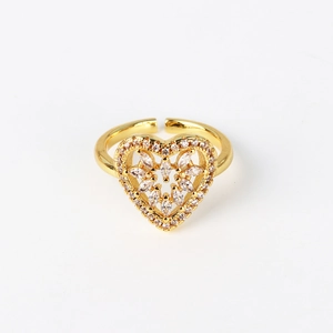Detail of heart-shaped open ring in gold finish with micro-pave white zircon crystals