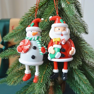 Christmas tree ornaments featuring 3D Santa and snowman figurines with hanging loops