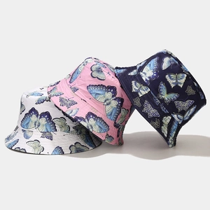 Foldable butterfly print bucket hat in white, pink, and navy for women summer sun protection