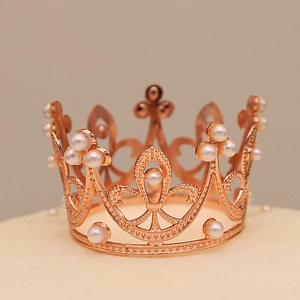 Elegant rose gold alloy crown cake topper with white pearls for birthday decorations