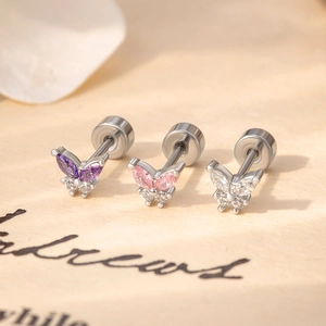 Mini zircon butterfly stud earrings with colorful crystals on elegant paper