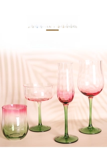 Handcrafted tulip-shaped glassware set with pink and green gradient finish