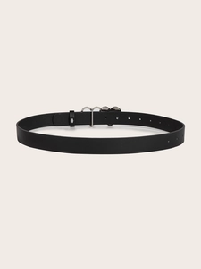 Close-up of black leather belt featuring two polished heart-shaped metal buckles
