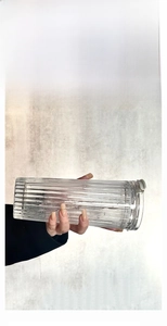 Detail of the leak-proof silicone seal and textured vertical stripes on glass coffee cup