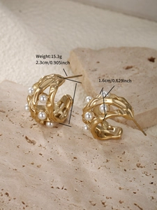 Detail view of gold hollow C-shaped pearl earrings showing 2.3cm diameter and 15.3g weight