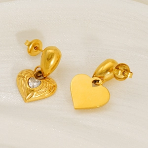 Elegant 18k gold plated hammered heart earrings with crystal stone on white silk