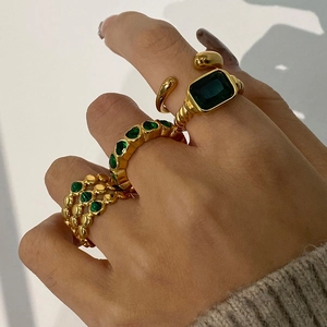 Vintage gold heart and rectangle green gemstone rings set with twisted rope texture