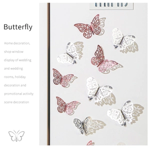 Detail of pink and silver 3D hollow butterfly wall stickers for home decoration