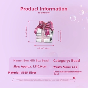 Close-up of pink bow gift box charm in 925 sterling silver for DIY bracelet