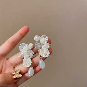 Floral earrings with blue teardrop beads and pearls in gold-tone setting