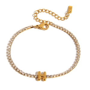 Close-up of 18K gold-plated bracelet with Zircon-studded letter H and lobster clasp