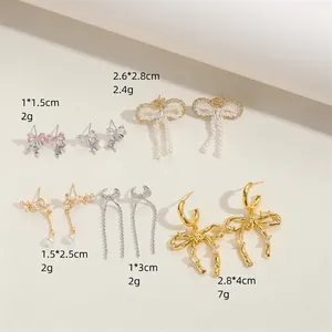 French vintage bow earrings set with size measurements and pearl gold details