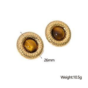 Detail of 26mm gold-plated round earrings featuring polished brown tiger eye stone
