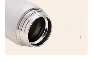 Detail of food-grade 304 stainless steel thermos with smooth polished cup rim