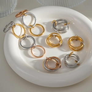 Interlocking stainless steel stackable rings in gold, silver and rose gold finishes