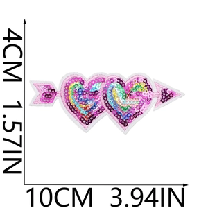 Detailed view of pink sequined heart with arrow embroidery patch, measures 10cm x 4cm