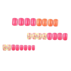 Short square glossy press-on nails with pink orange tones and colorful floral designs
