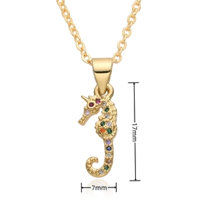 Detailed view of colorful zircon seahorse pendant in gold with 17mm height measurement