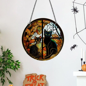 Detail of Halloween round pendant with two black cats and moon on metallic chain