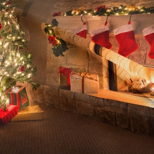 Close-up of thick fabric texture and festive fireplace print on Christmas tree tapestry