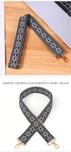 Detail view of ethnic geometric weave bag strap with golden metal clasps and size info