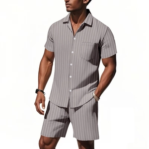 Close-up of men's grey linen short sleeve shirt and shorts set with white stripes
