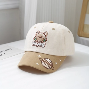 Detail of cartoon dog embroidery and star patterns on this kids baseball cap