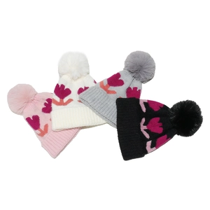 Winter knitted baby hats with tulip flower patterns and large fluffy pompoms in four colors
