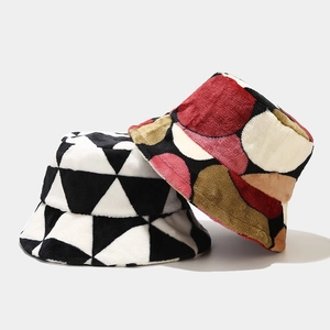 Winter plush bucket hats featuring geometric triangle and retro patchwork patterns