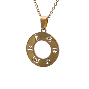 Detail of golden stainless steel Om pendant necklace with engraved Tibetan characters
