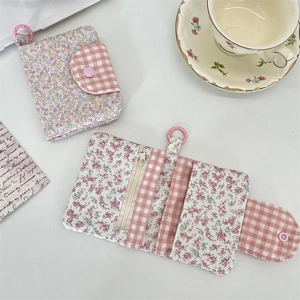 Floral and checkered cotton wallet with multiple card slots and secure zipper pocket