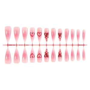 Faux ongles dégradés roses avec motifs de cœurs rouges et effet goutte sur fond blanc