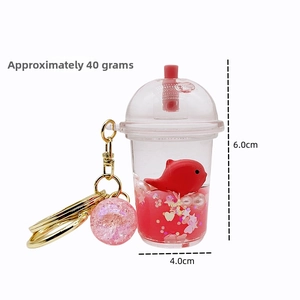 Detailed view of bubble tea cup keychain showing dimensions 6cm height and 4cm width