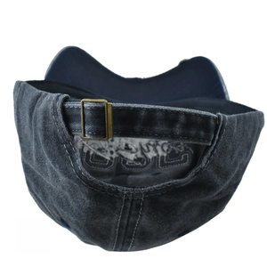 Detail of adjustable metal buckle and strap on the back of washed cotton baseball cap