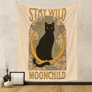Bohemian tapestry featuring a black cat and gold moon with Stay Wild Moonchild text