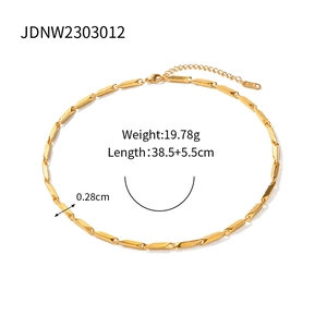 Detail of gold rhombic chain showing K18 stamp, lobster clasp and 19.78g weight