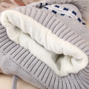 Winter boys knitted grey hat with jacquard pattern, fur pompom and warm white fleece lining