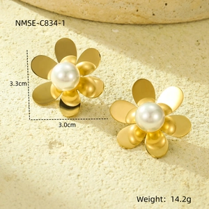 Detailed view of gold flower pearl earrings with dimensions 3.3cm by 3.0cm