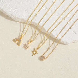 Golden titanium necklaces with rainbow, flower, and sun pendants featuring zircon stones