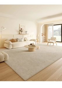 Close-up of cream textured waterproof living room rug on light wooden flooring