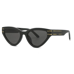 Cat eye triangle frame sunglasses with dark grey lenses and gold metal temple accents