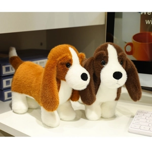 Detailed view of two soft beagle plush toys with fluffy fur and realistic floppy ears