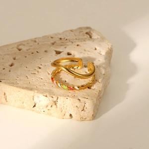 Detail of 18K gold-plated double-layer ring with colorful enamel inlay on stone