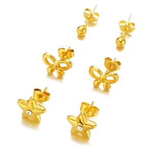 Three-piece gold earring set featuring round bead, bow, and rhinestone star designs