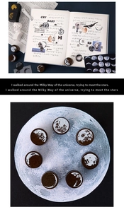 Macro view of moon phase wooden stamps for scrapbooking and vintage DIY diary decoration