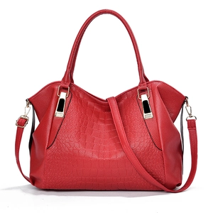 Large red crocodile pattern tote bag with gold hardware and removable shoulder strap